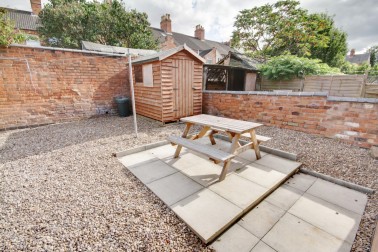 South-facing garden with picnic bench is perfect for BBQs; lockable bike storage shed