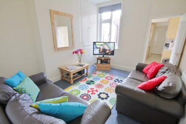 Comfy living room with modern furniture & 37" LED HD TV