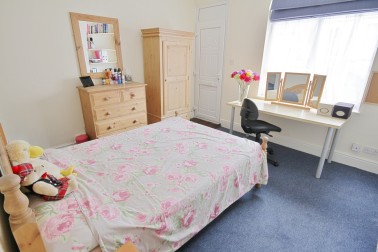Large double bedroom (1); ground floor front with large desk by window