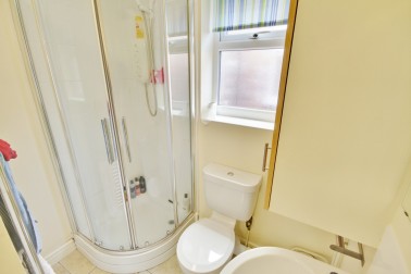 Gleaming white ground floor bathroom (1); thermostatic shower, basin & loo