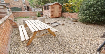 Enclosed gardens with picnic bench are perfect for BBQs; lockable bike storage shed 14/21